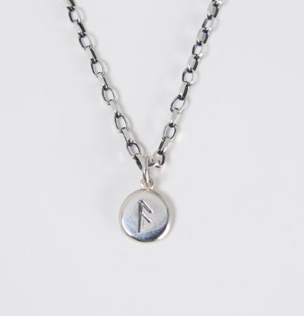 Seidr Frum Charm in recycled sterling silver stamped with the Ansuz rune, a small tactile pebble talisman handcrafted in Wiltshire