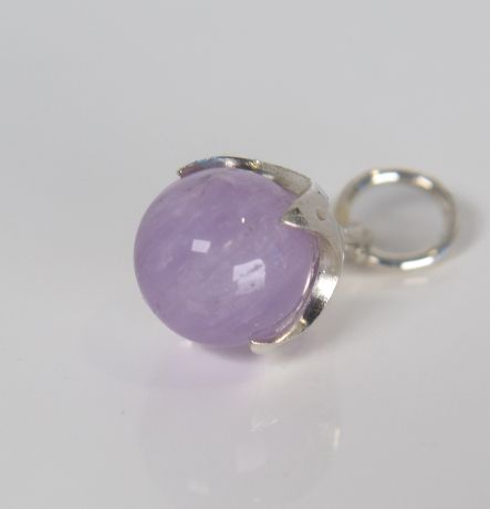 Silver Ferian pendant with amethyst bead on white background