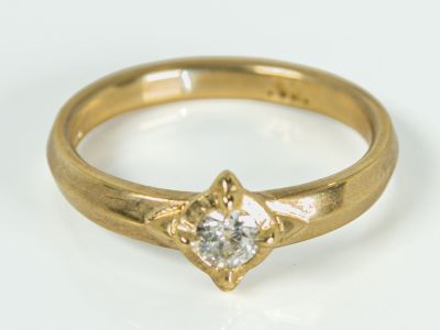 True North 9ct yellow gold engagement ring featuring a 0.30ct old cut diamond in a compass-inspired setting