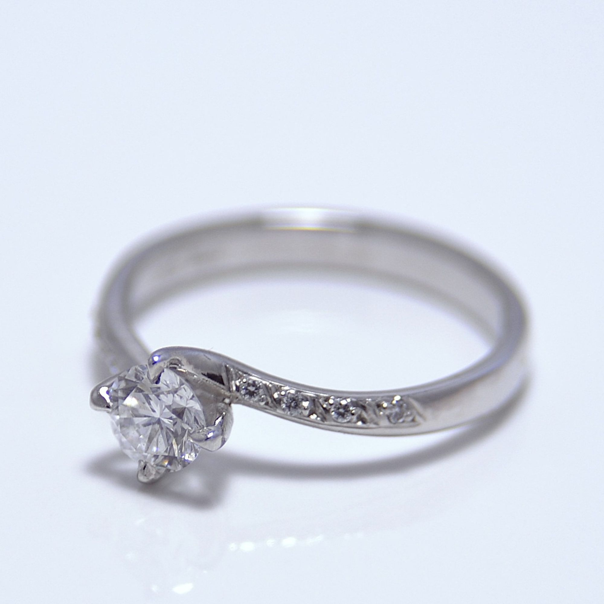 Bespoke engagement ring featuring inherited family diamonds in a handmade yellow gold setting by Tom McDanielson at The Middle Green
