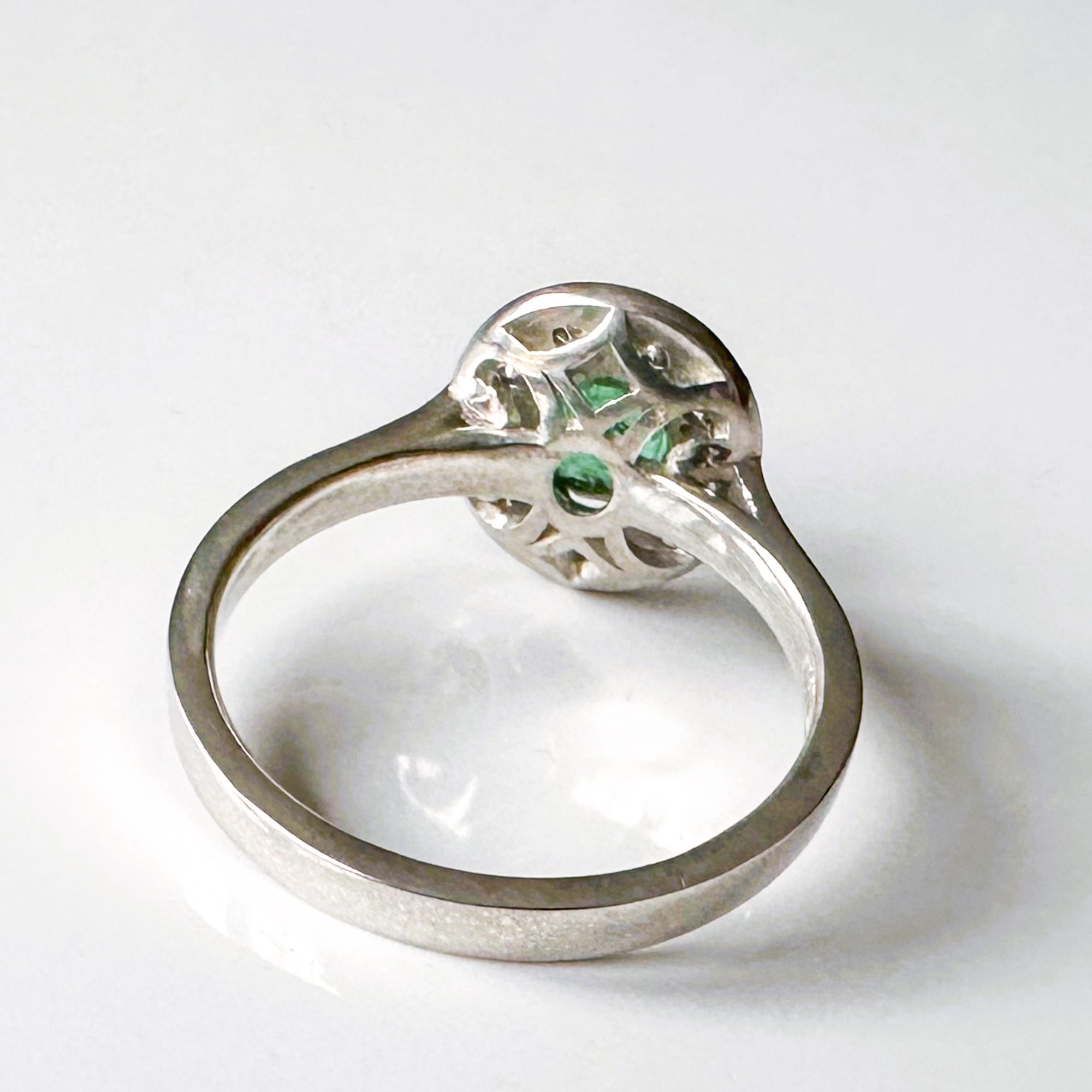 Engagement ring with hidden detail beneath the setting