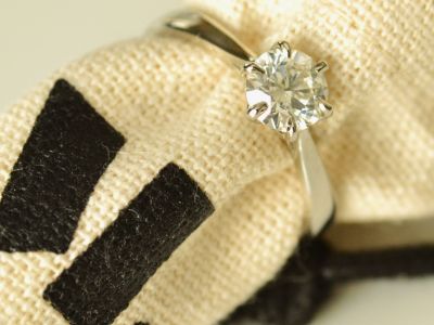 Handmade engagement ring with an antique-style diamond in a textured yellow gold setting by The Middle Green Alternative slightly more SEO-focused version: Handmade platinum engagement ring with 1ct round brilliant cut diamond by The Middle Green