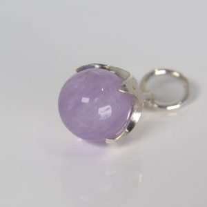 Silver Ferian pendant with amethyst bead on white background