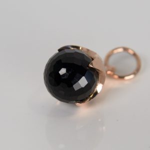 9ct rose gold Ferian pendant with onyx bead on white background